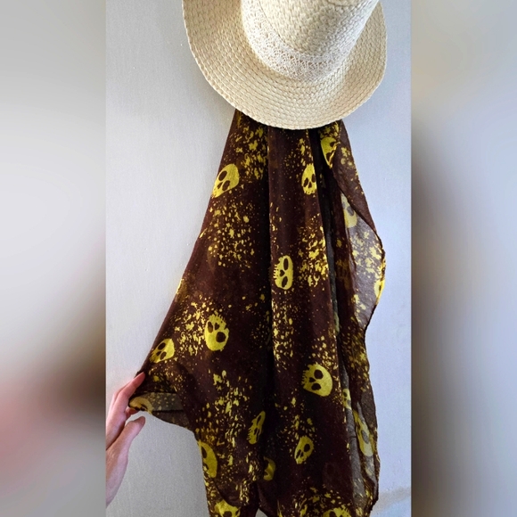 Sheer scarf. Brown with yellow skull print. - Picture 1 of 5